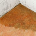What is the cheapest way to waterproof a basement?